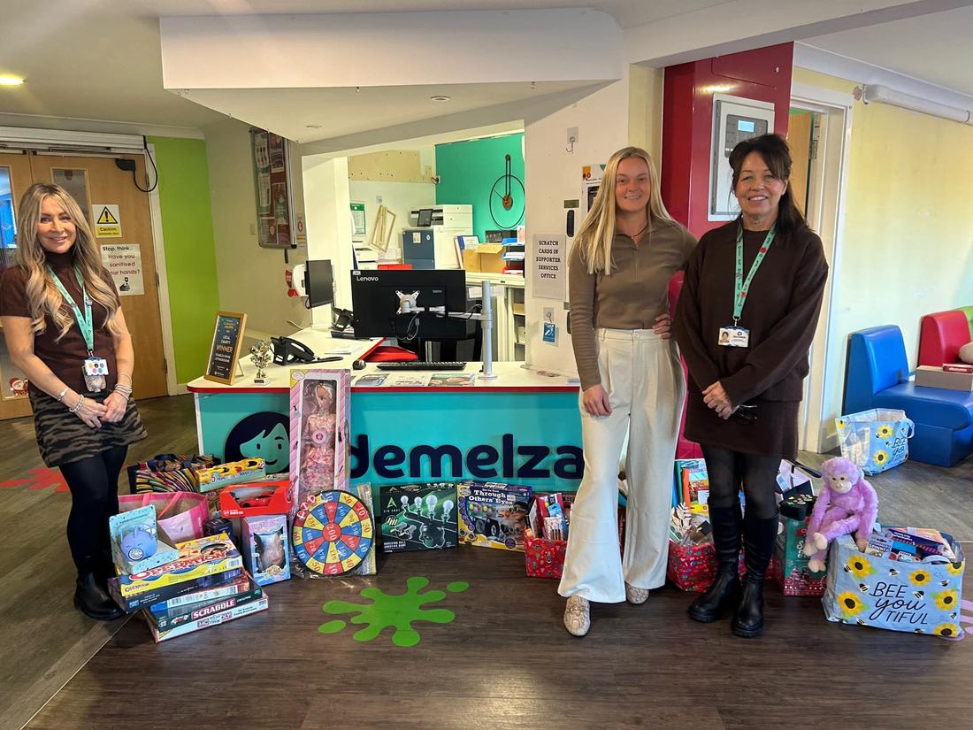 Lauren Baker with a local charity donation